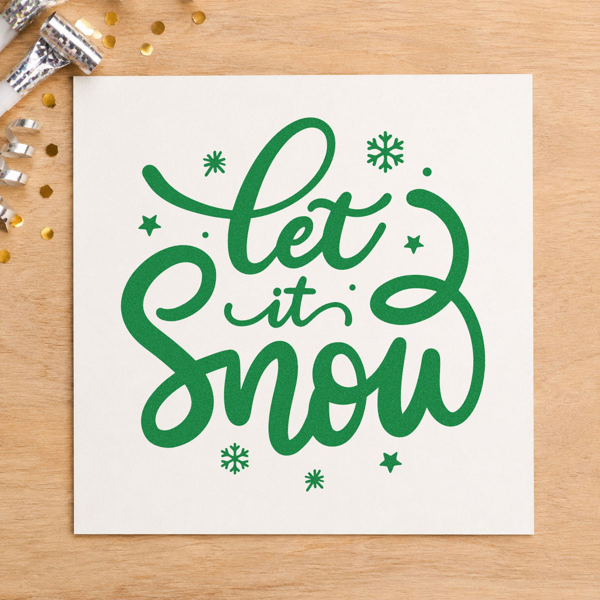Let It Snow Script craft stamp imprint in green ink on a handmade project, one idea being framed porch ledge.