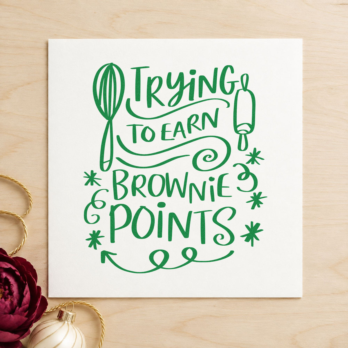 Trying To Earn Brownie Points craft stamp imprinted in green ink on paper, a design suited to cellophane seals.