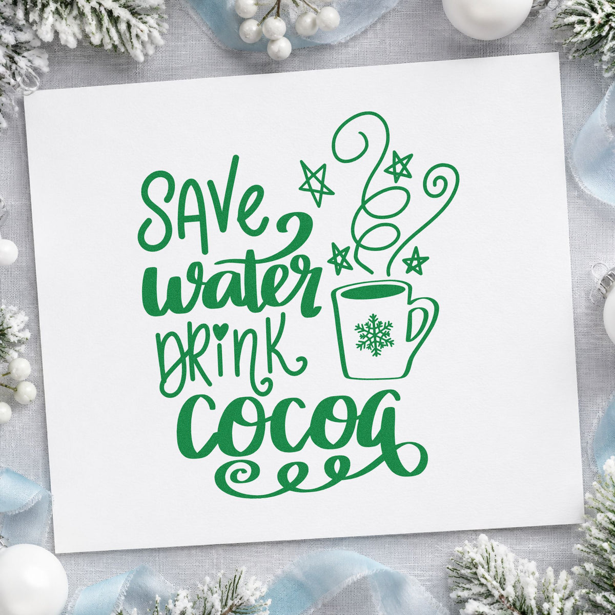 Save Water Drink Cocoa craft stamp imprint in green ink on a handmade project, one idea being recipe sheet pages.