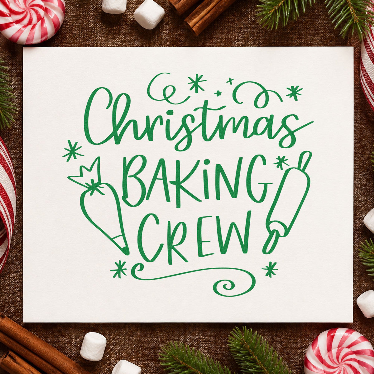Christmas Baking Crew craft stamp imprint in green ink on a handmade project, one idea being framed kitchen door.