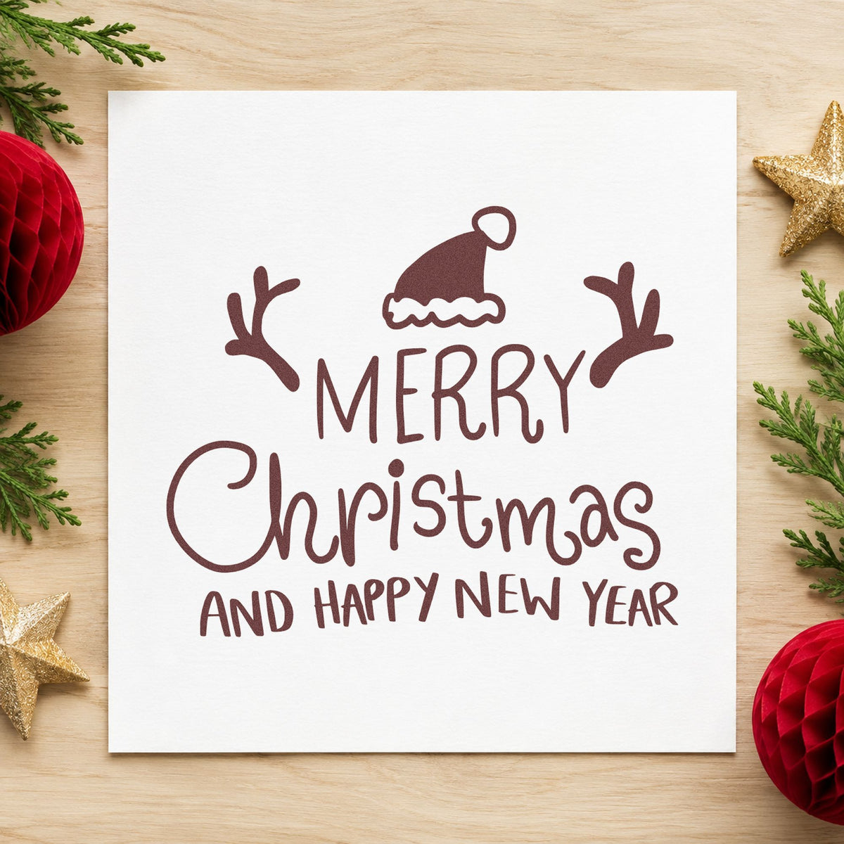Merry Christmas Happy New Year rubber stamp printed in brown ink, ready for hamper slot labels and similar paper crafts.