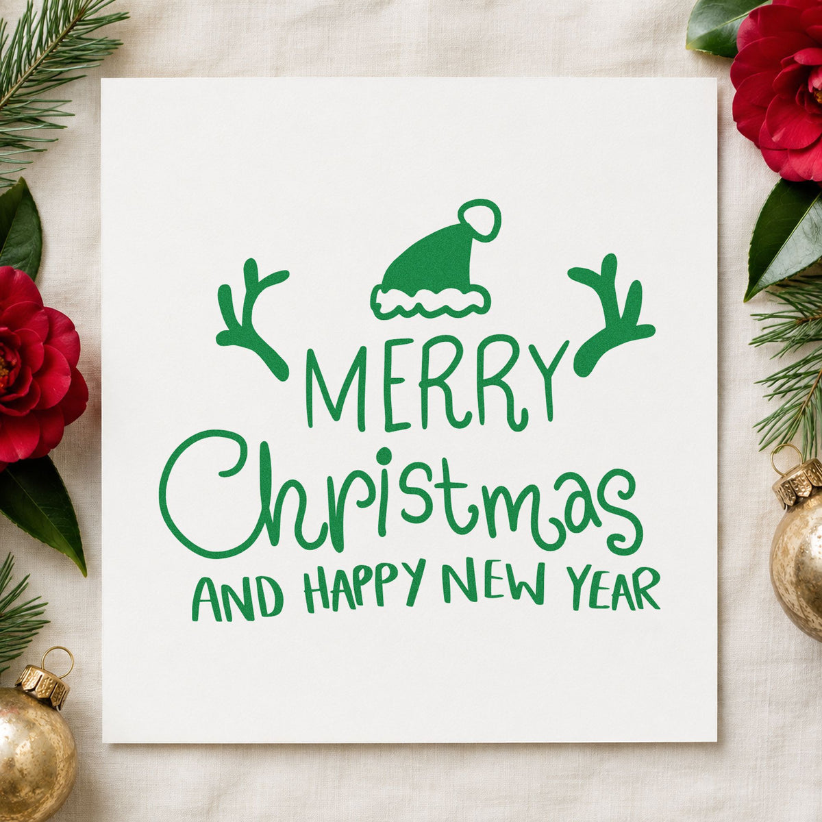 Merry Christmas Happy New Year craft stamp imprinted in green ink on paper, a design suited to late post seals.