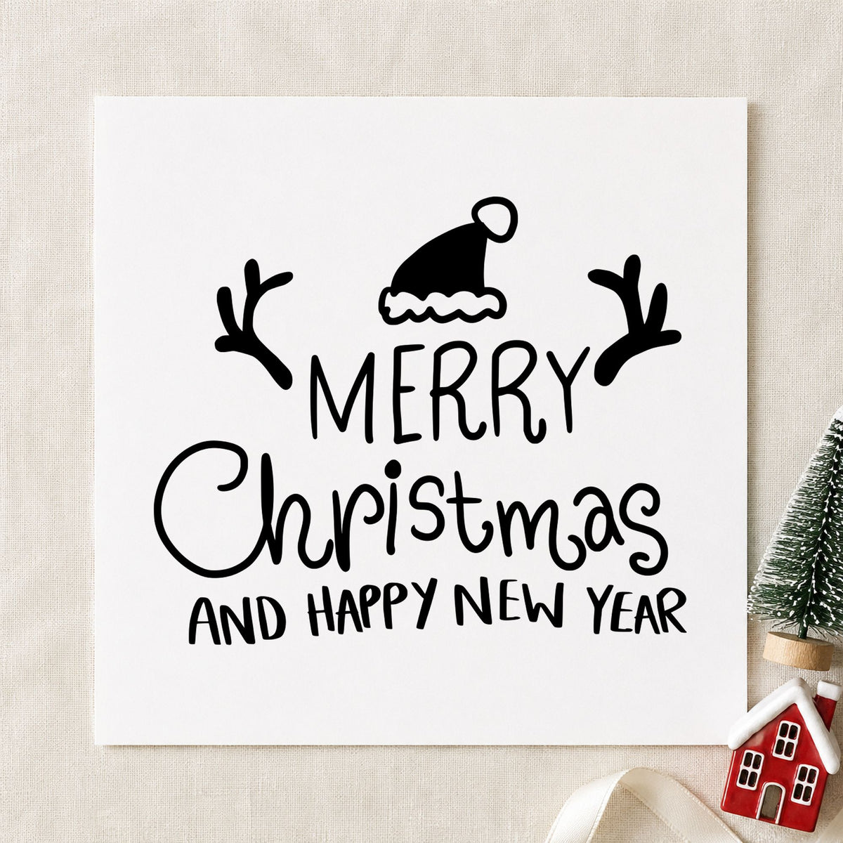 Merry Christmas Happy New Year rubber stamp printed in black ink, ready for antler hat cards and similar paper crafts.