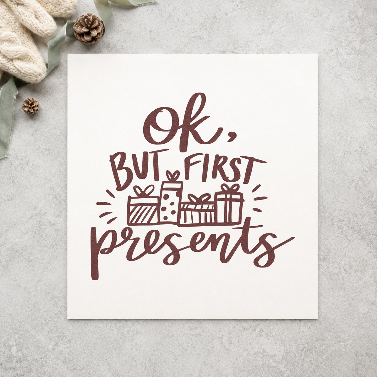 Ok But First Presents rubber stamp printed in brown ink, ready for gift pile labels and similar paper crafts.