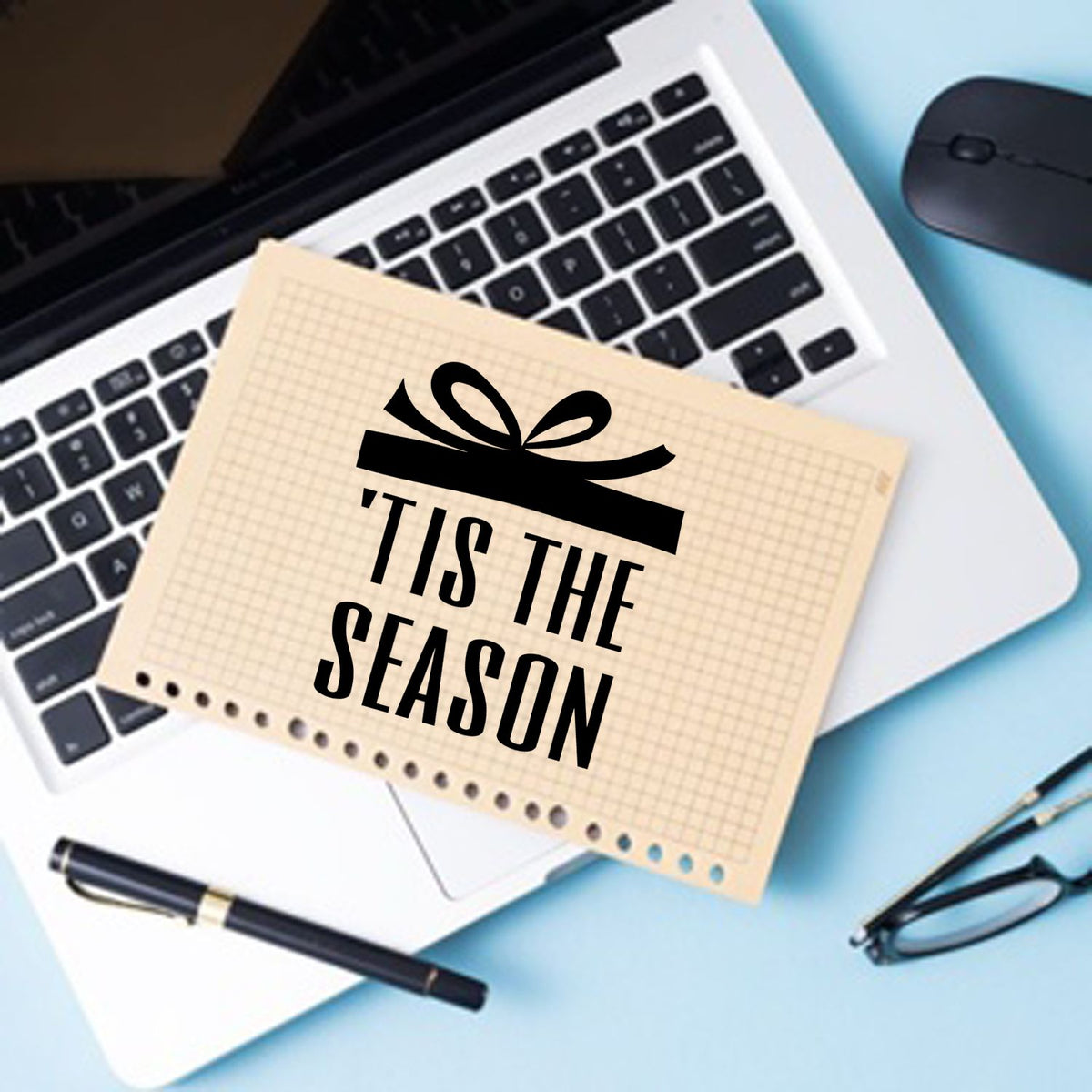 Custom rubber stamp design reading Tis the Season for holiday cards, packaging, and festive seasonal crafts.