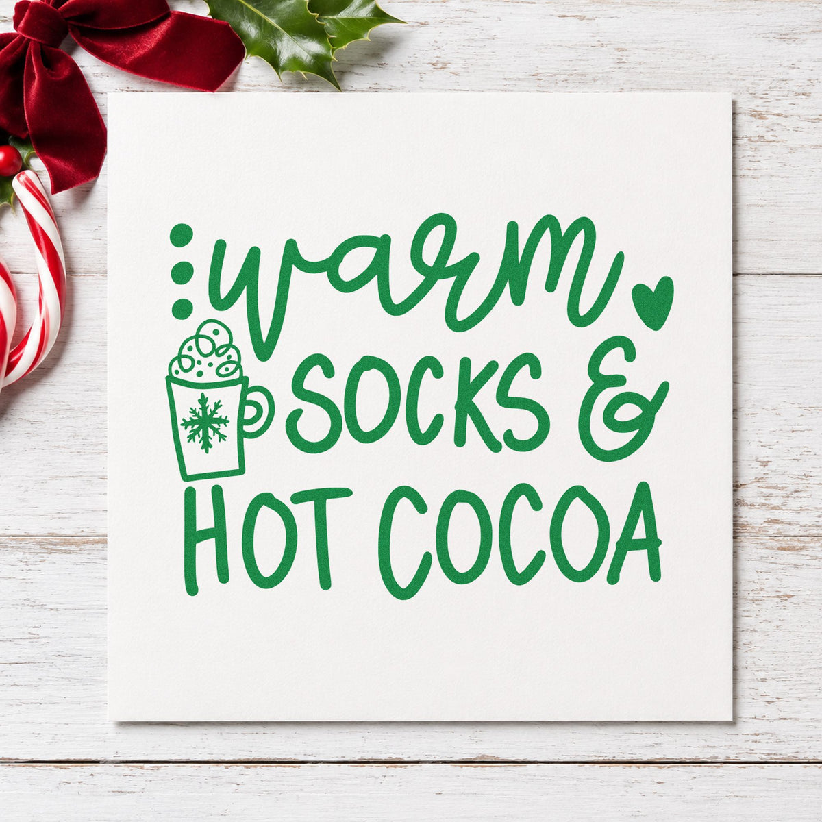 Warm Socks And Hot Cocoa craft stamp imprint in green ink on a handmade project, one idea being slumber night invites.