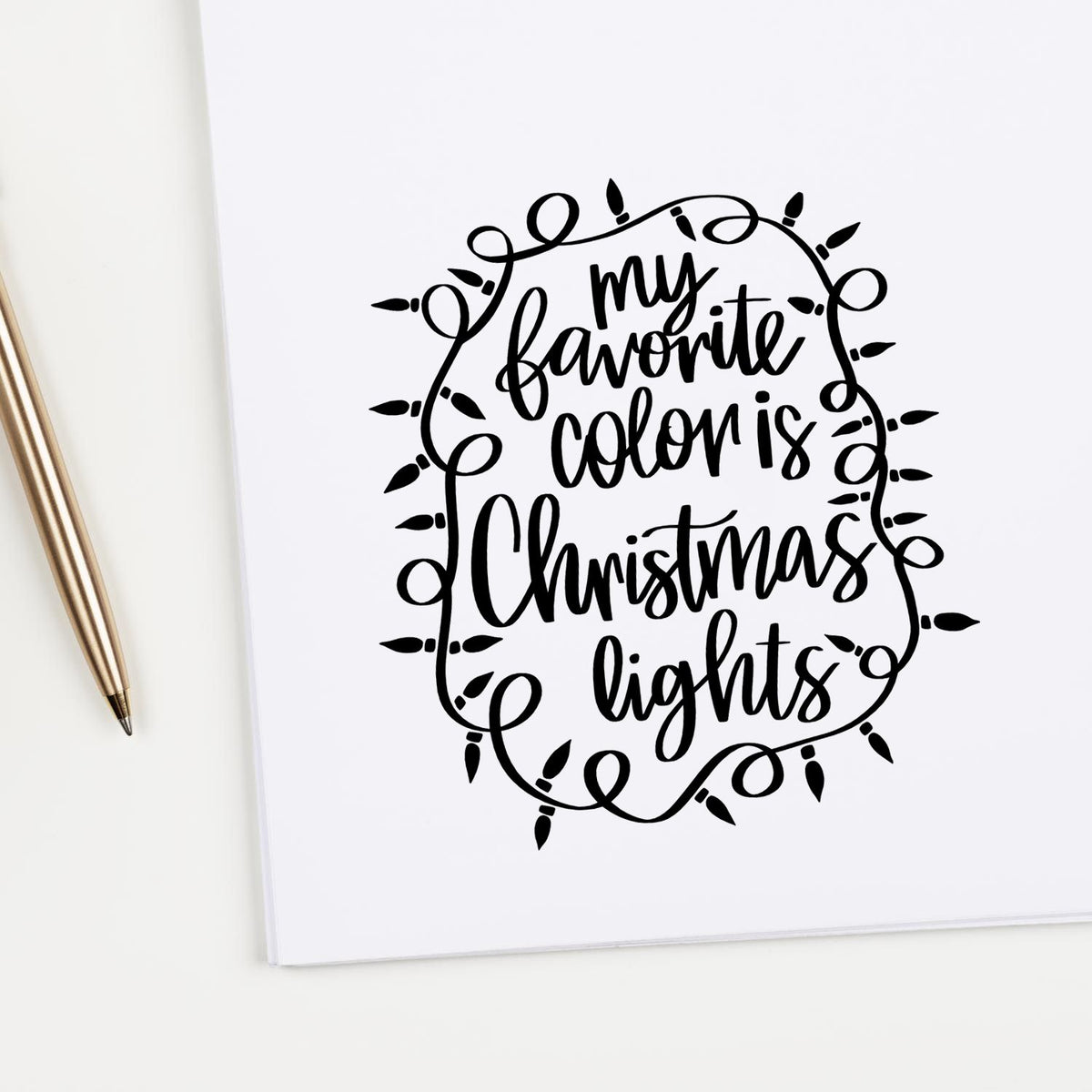 Christmas rubber stamp design with festive quote My favorite color is Christmas lights in decorative script and light-bulb border.