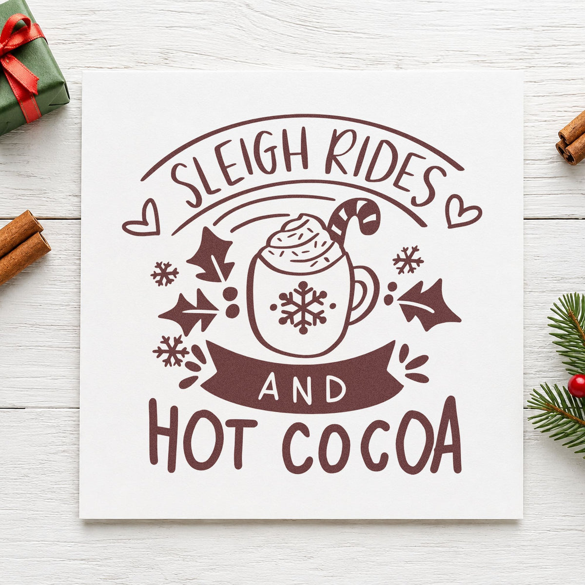 Sleigh Rides And Hot Cocoa rubber stamp printed in brown ink, ready for outing plan pages and similar paper crafts.