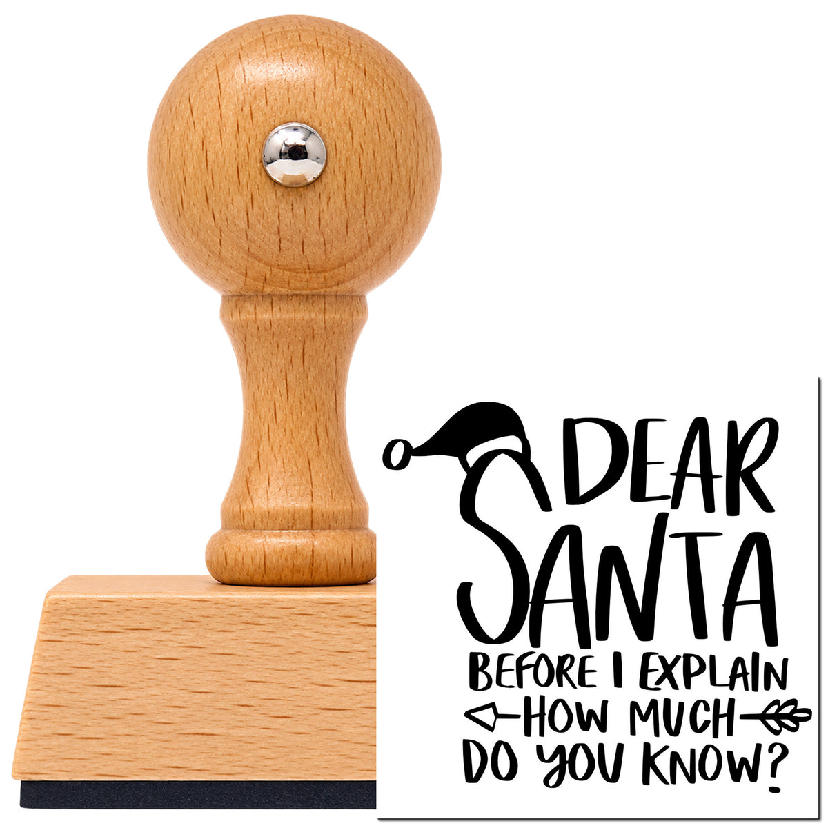 Dear Santa Before I Explain How Much Do You Know? Vintage Pro rubber stamp in European beech wood with a round knob handle, shown beside its black imprint.