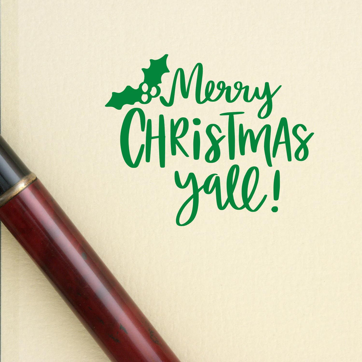 Merry Christmas yall rubber stamp impression with holly, ideal for holiday cards and custom festive stationery.