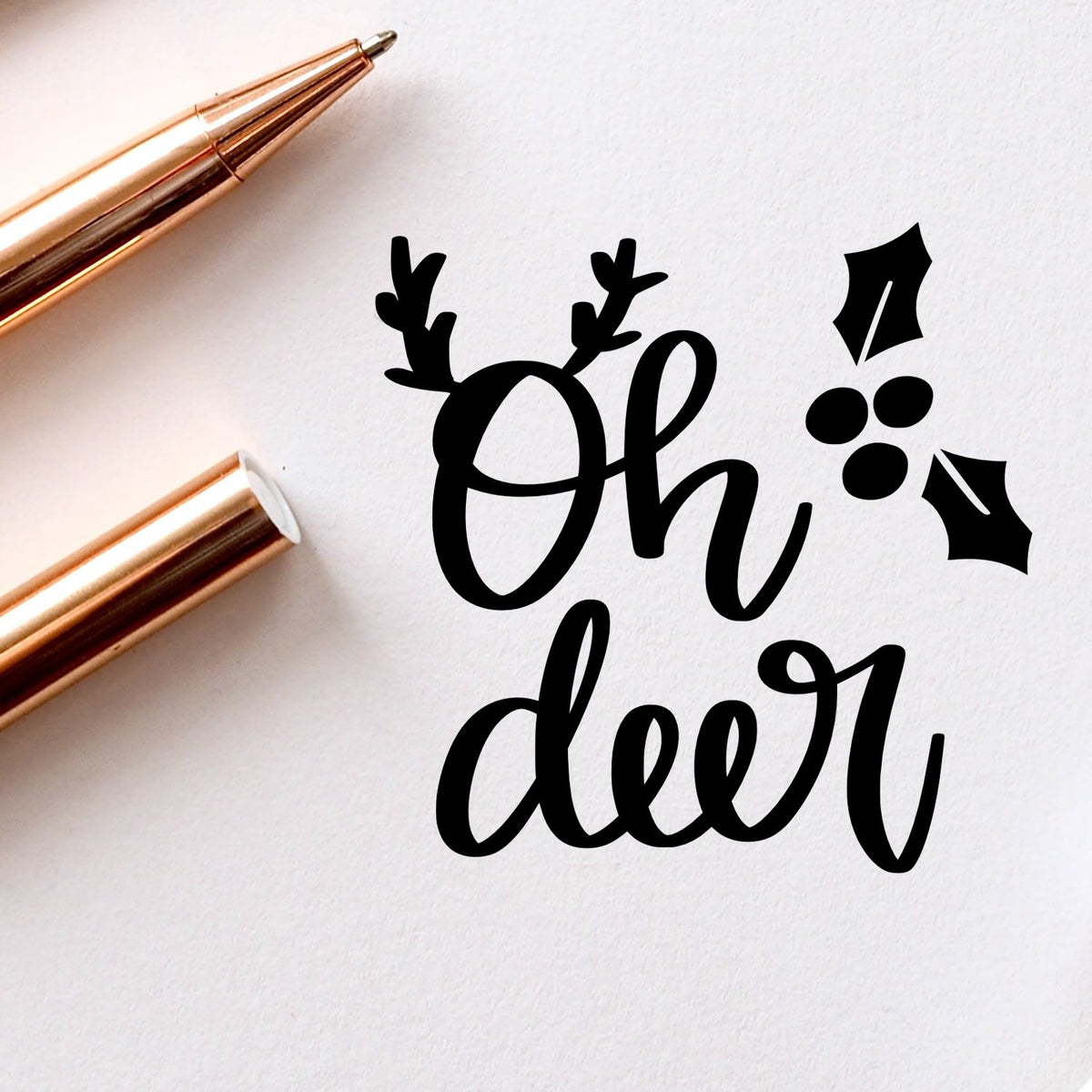 Oh Deer rubber stamp design with festive antlers, perfect for holiday cards, handmade crafts, and winter paper projects.