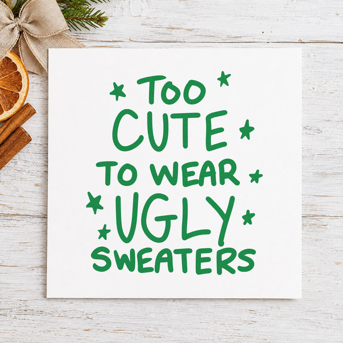 Too Cute Ugly Sweaters craft stamp imprint in green ink on a handmade project, one idea being style swap invites.