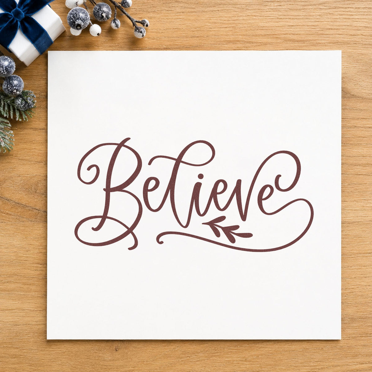 Believe With Leaf Flourish rubber stamp printed in brown ink, ready for guest book opener and similar paper crafts.