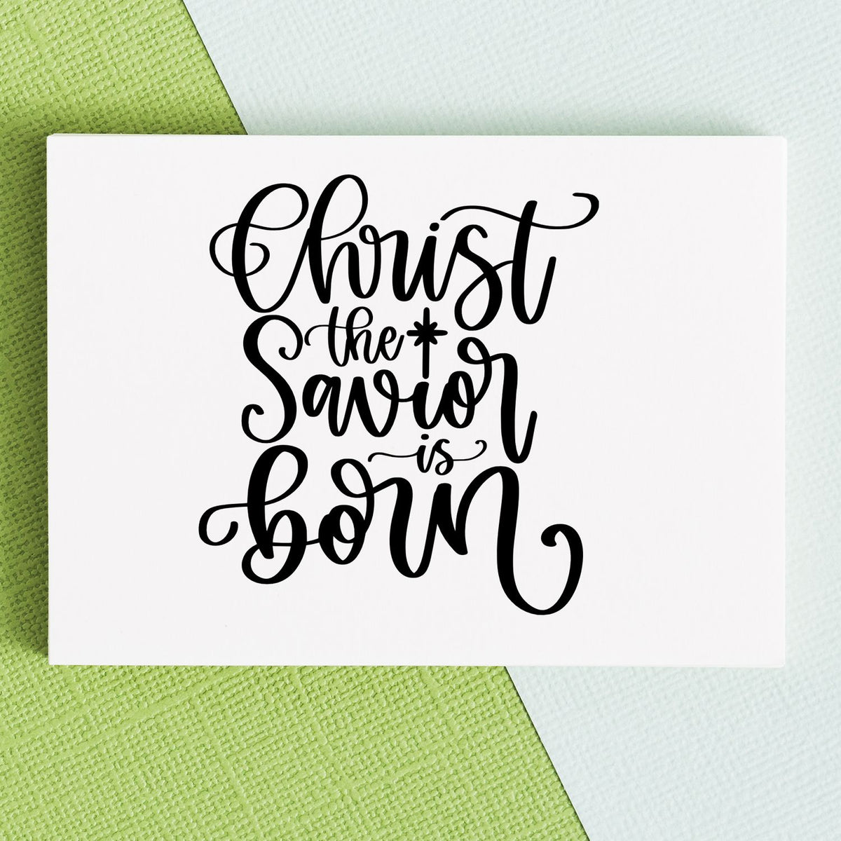 Christ the Savior is Born rubber stamp design in elegant calligraphy for Christmas cards and faith-based holiday crafts.