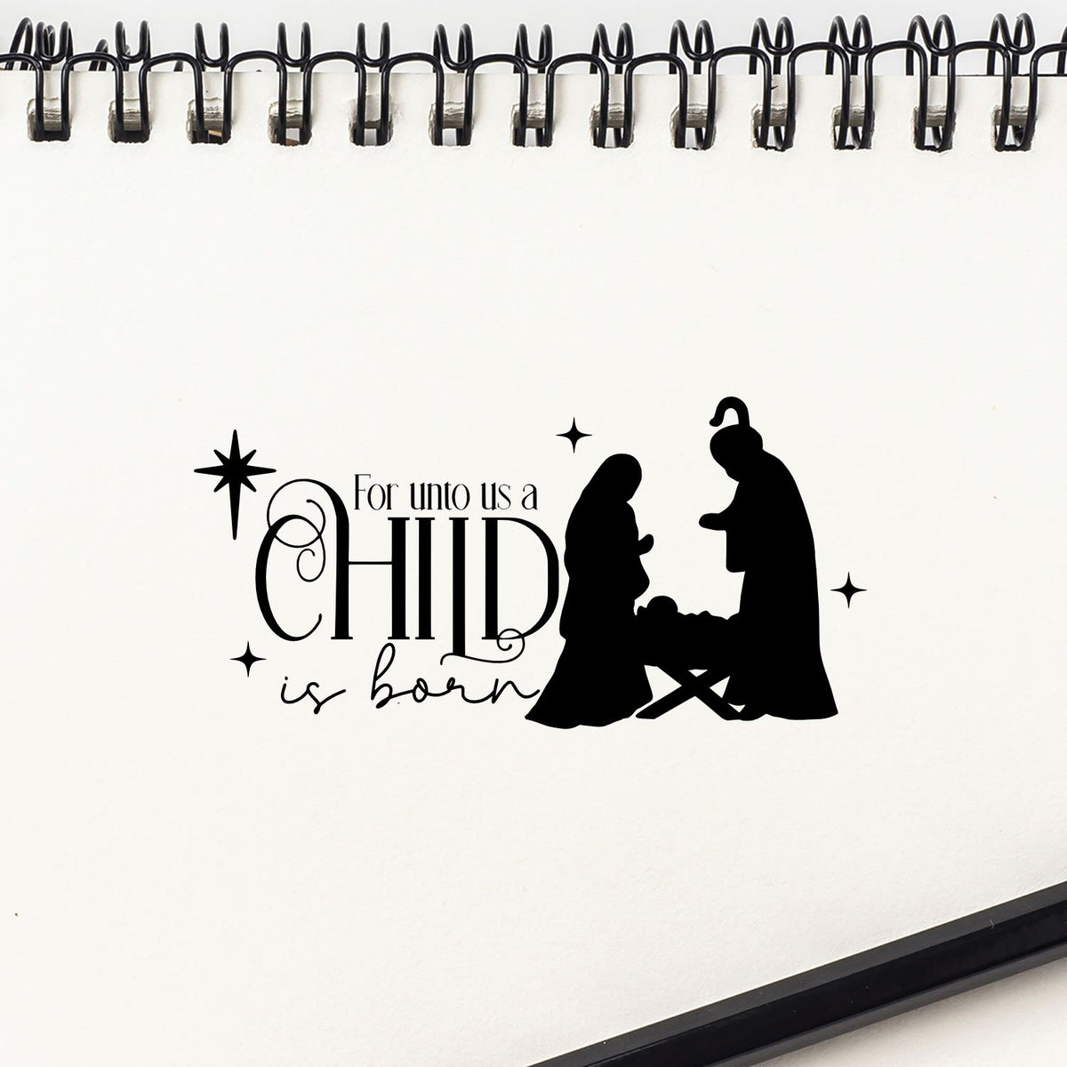 Christian Christmas rubber stamp design reading For unto us a Child is born with nativity silhouettes and star accents.