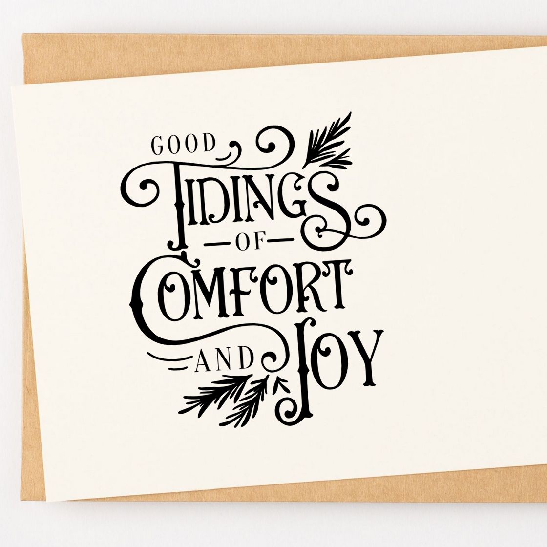 Christmas rubber stamp design with Good Tidings of Comfort and Joy for holiday cards and festive paper crafts.