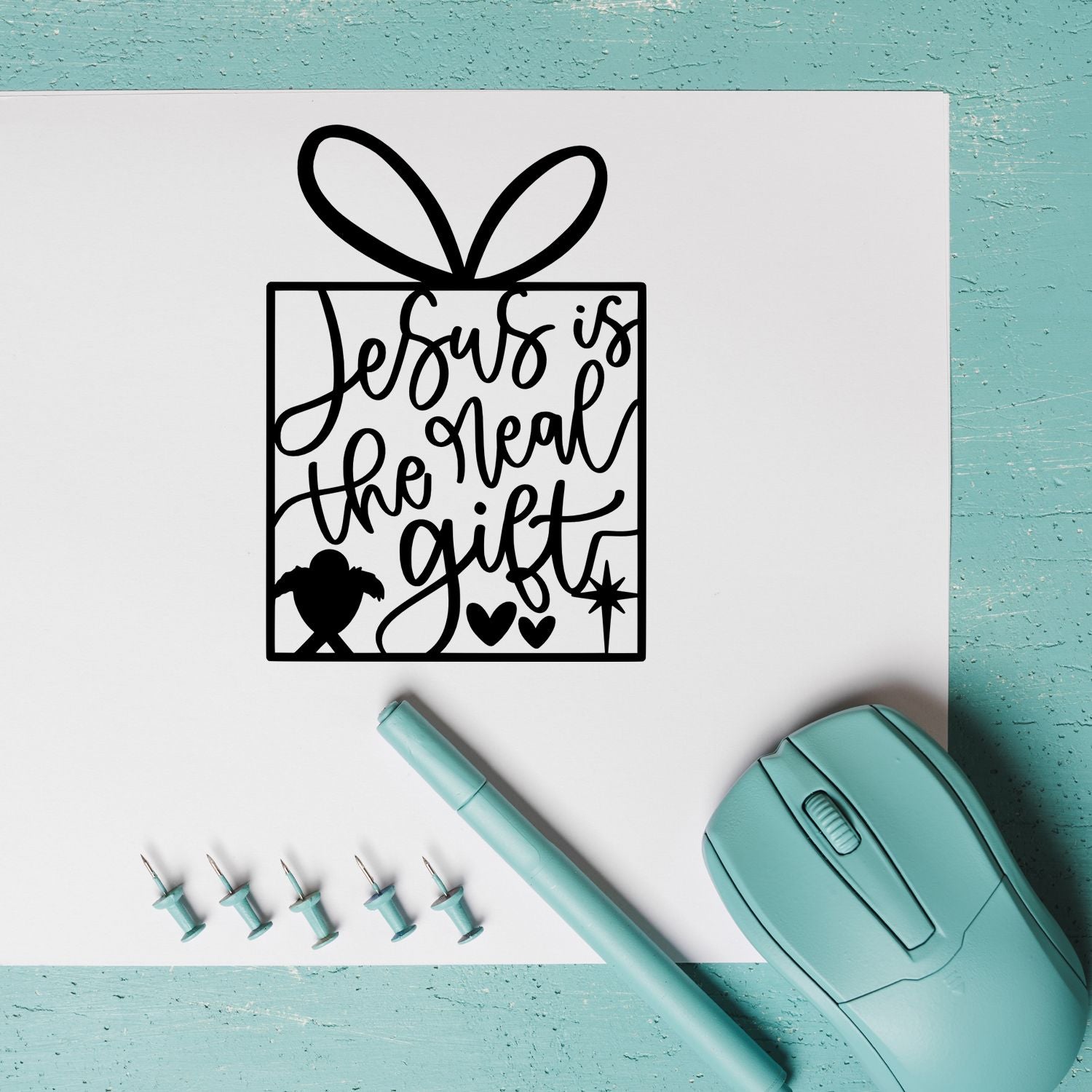 Christian rubber stamp design reading "Jesus is the real gift" for faith-based holiday cards, gift tags, and paper crafts.