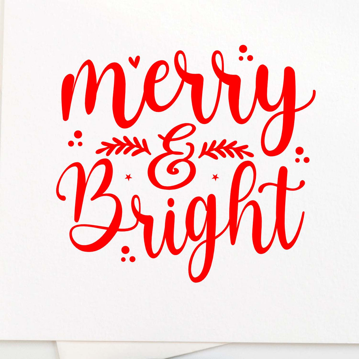 Merry & Bright festive holiday rubber stamp design in red script with decorative accents.