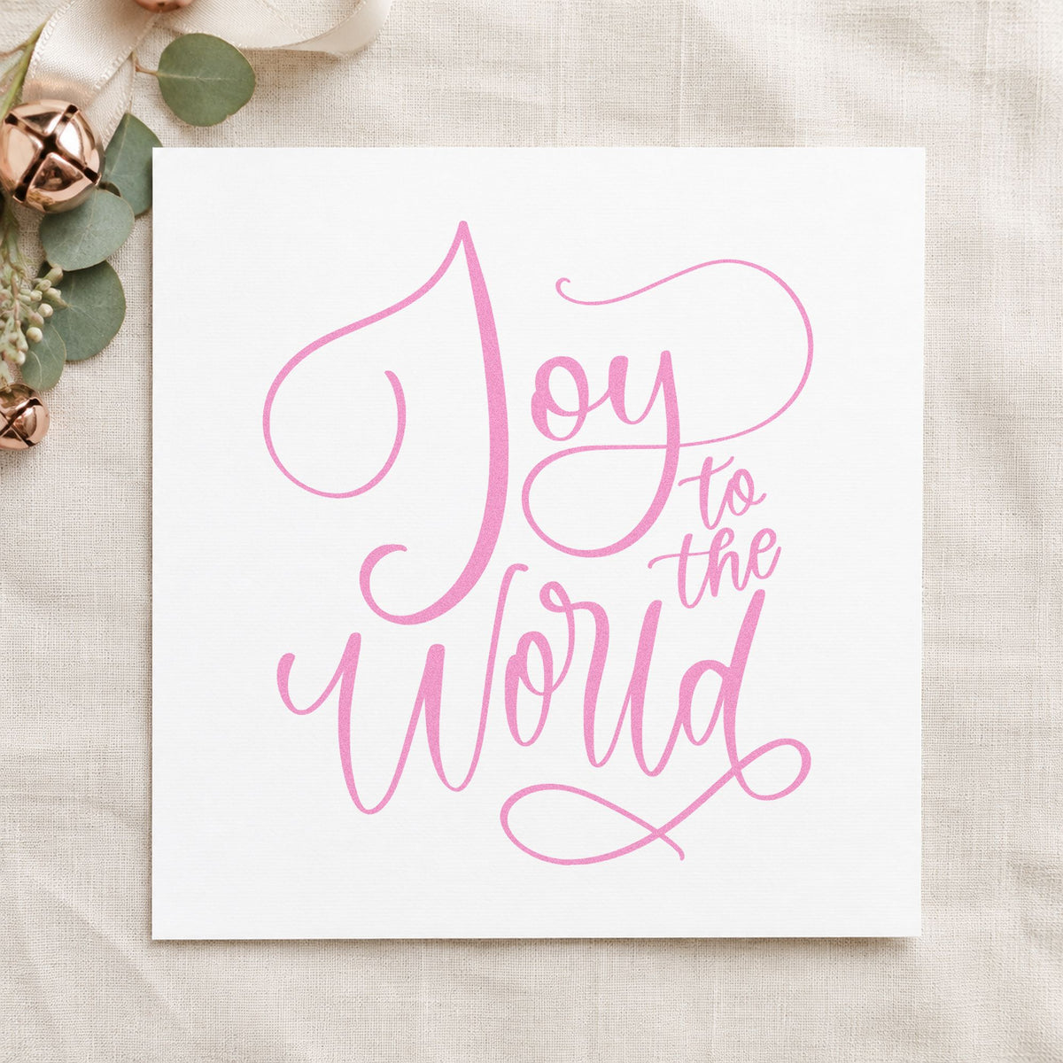 Joy To The World Thin Script craft stamp in purple ink on cardstock, an easy option for album title plate.