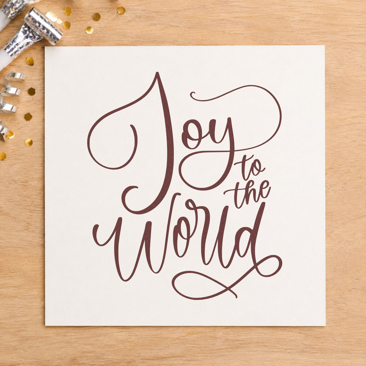 Joy To The World Thin Script rubber stamp printed in brown ink, ready for letter paper header and similar paper crafts.