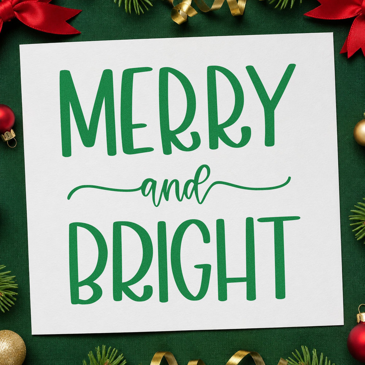 Merry And Bright Simple craft stamp imprint in green ink on a handmade project, one idea being long bookmark tags.