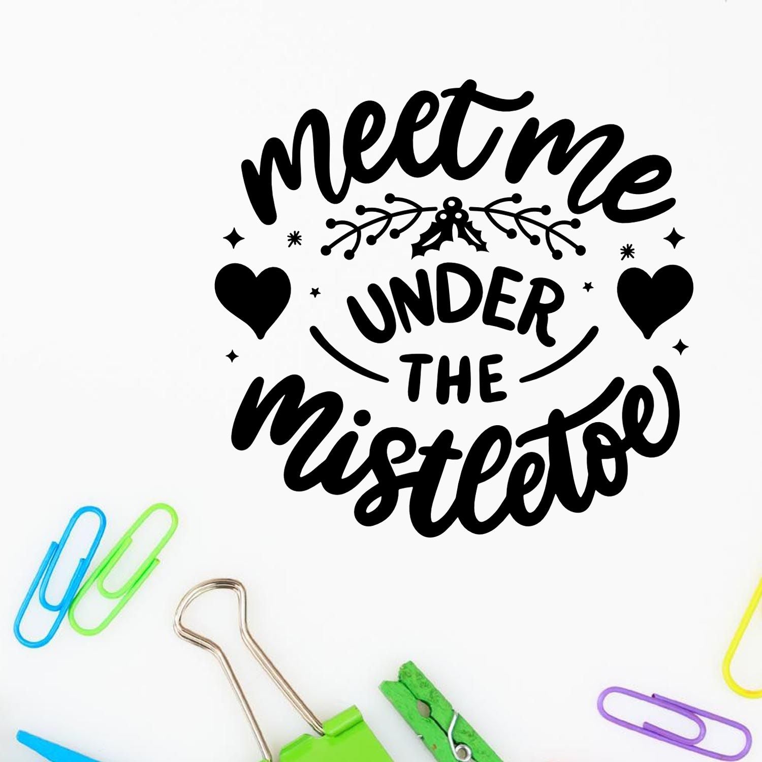 Christmas rubber stamp design reading Meet Me Under the Mistletoe with hearts and mistletoe for holiday crafts.
