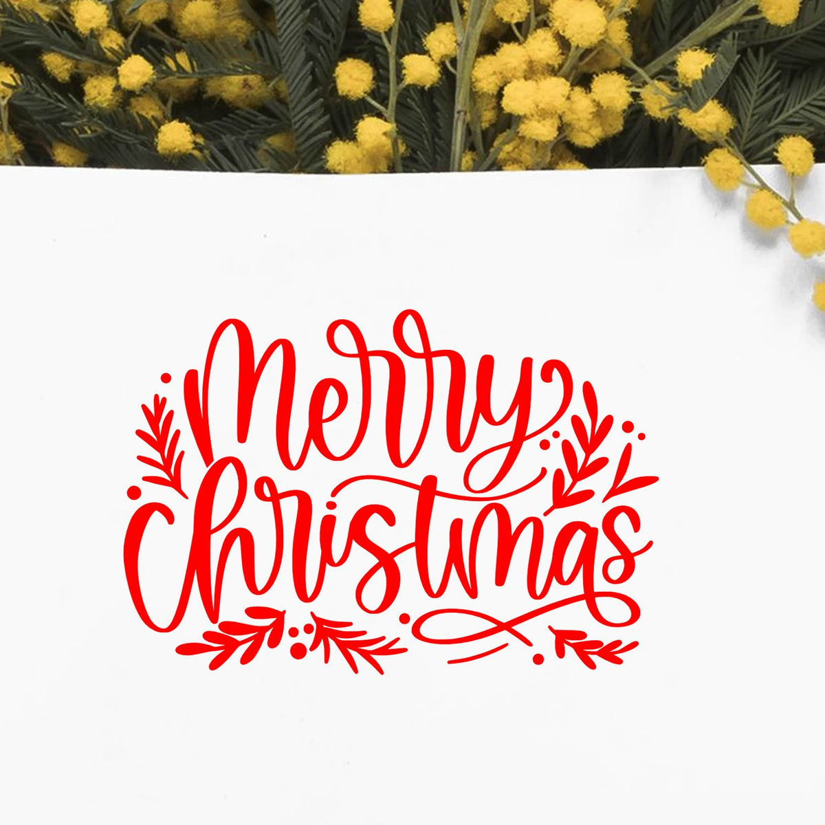 Merry Christmas rubber stamp design in festive red script with floral accents on a white background.