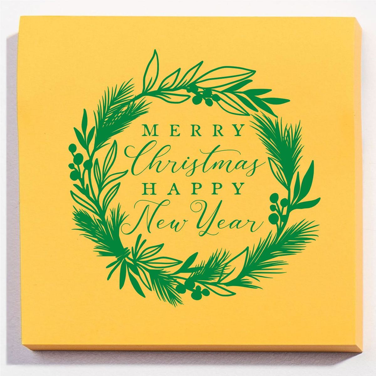 Christmas New Year Botanical Wreath rubber stamp shown in green ink, stamped for projects such as year end album page.