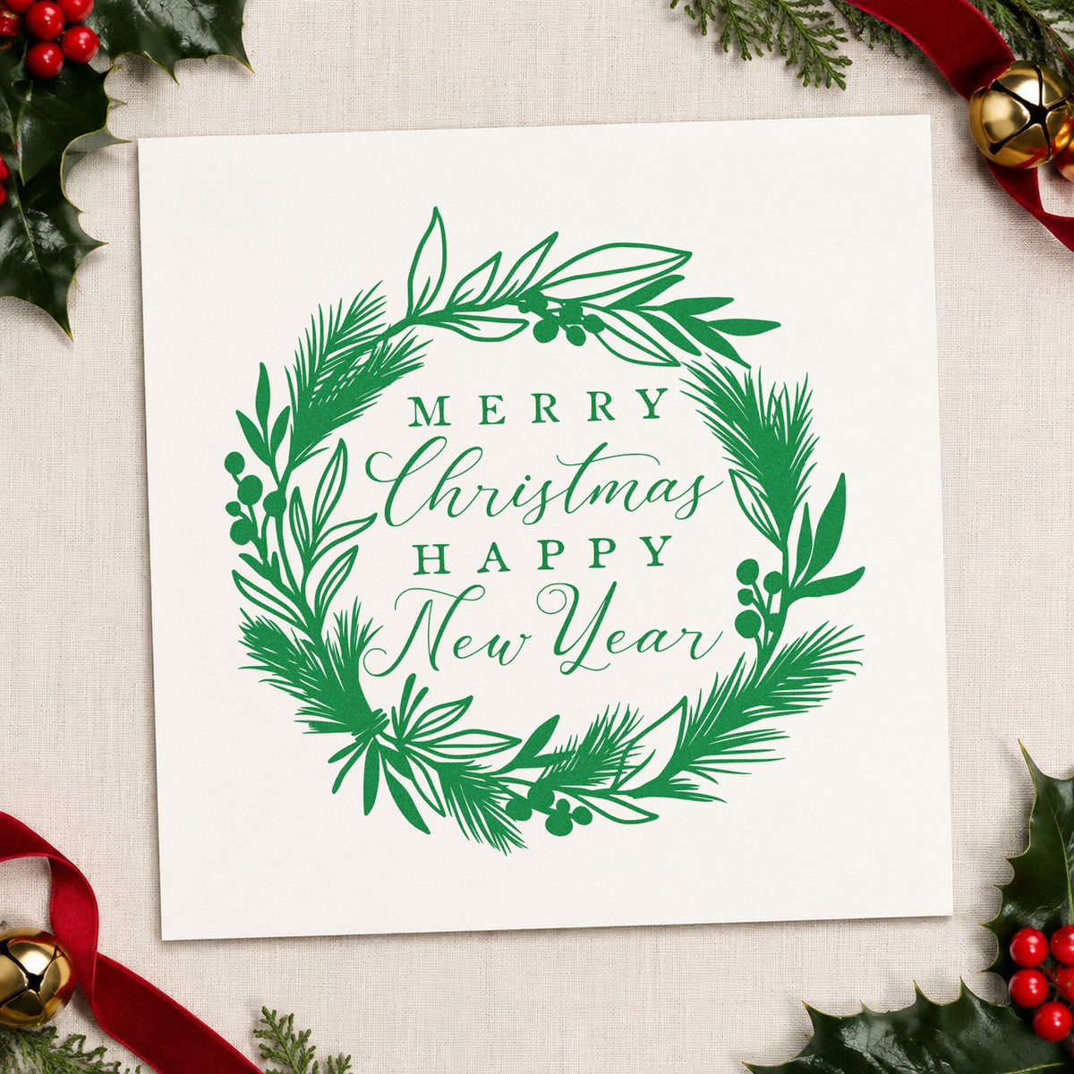 Christmas New Year Botanical Wreath craft stamp imprint in green ink on a handmade project, one idea being late send gift tags.
