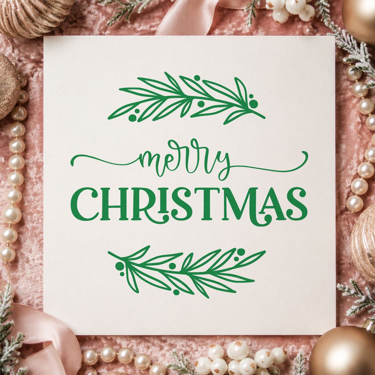 Merry Christmas Between Branches craft stamp imprinted in green ink on paper, a design suited to framed over mantel.