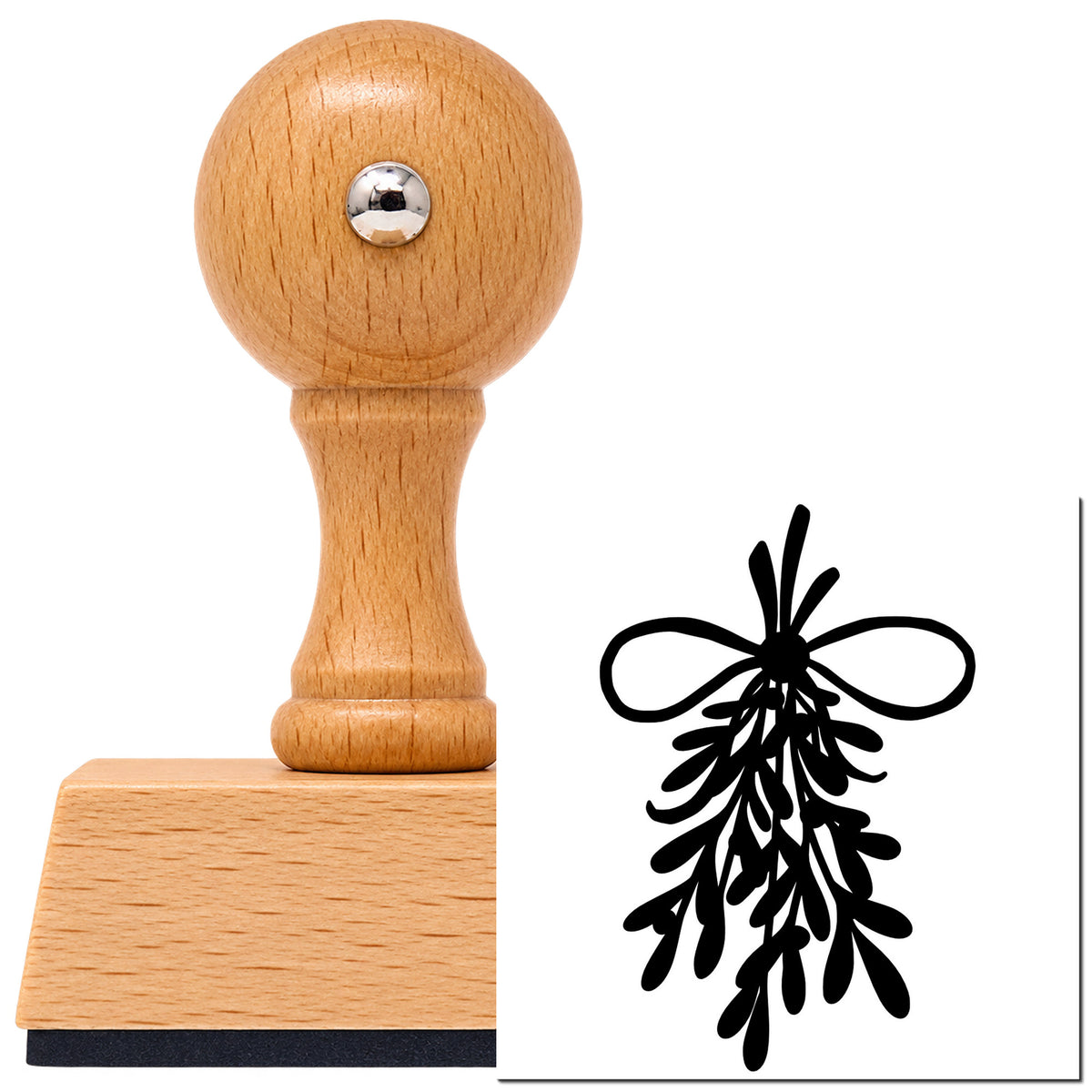 Mistletoe Bundle With Bow Leaf Accents Vintage Pro rubber stamp in European beech wood with a round knob handle, shown beside its black imprint.