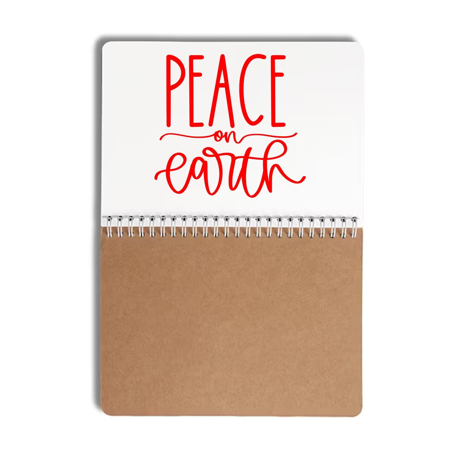Peace on Earth rubber stamp design with red hand-lettered holiday message on a spiral notebook cover.