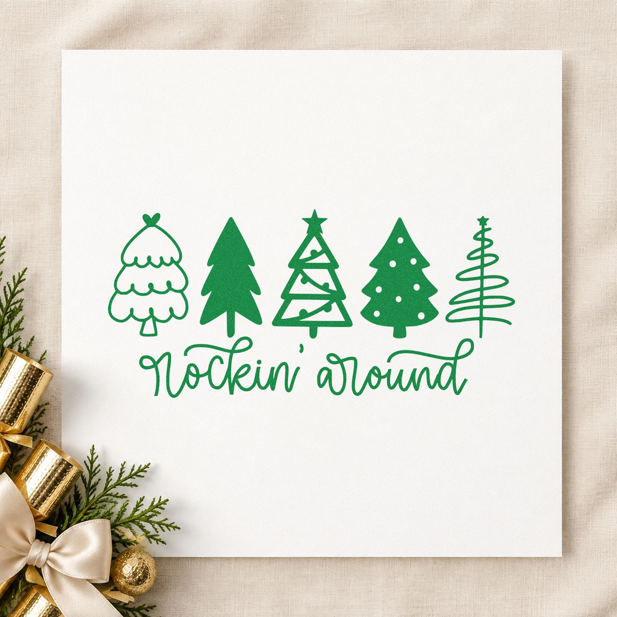 Rockin Around Christmas Trees craft stamp imprint in green ink on a handmade project, one idea being thrift find gift tags.
