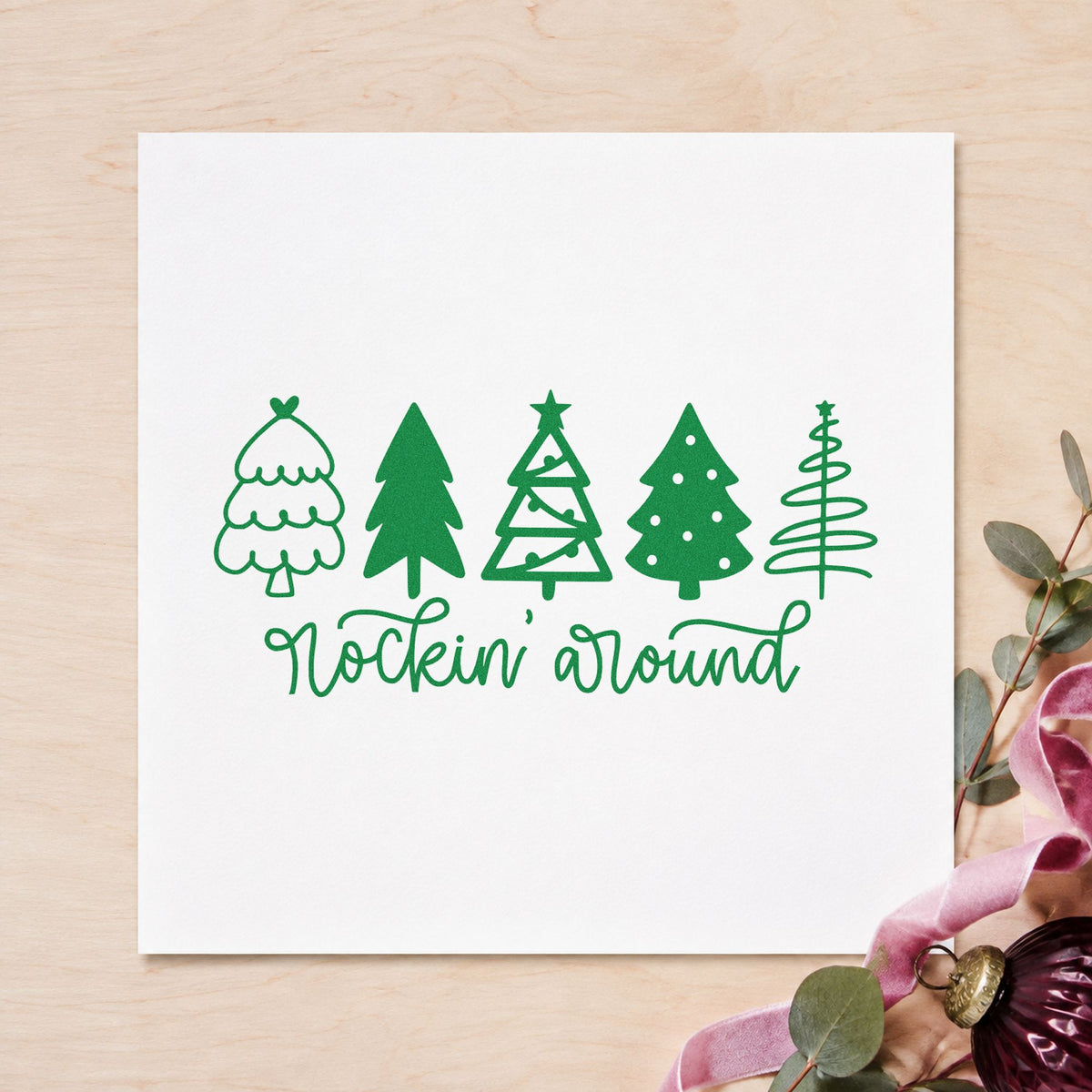 Rockin Around Christmas Trees craft stamp imprinted in green ink on paper, a design suited to framed console shelf.