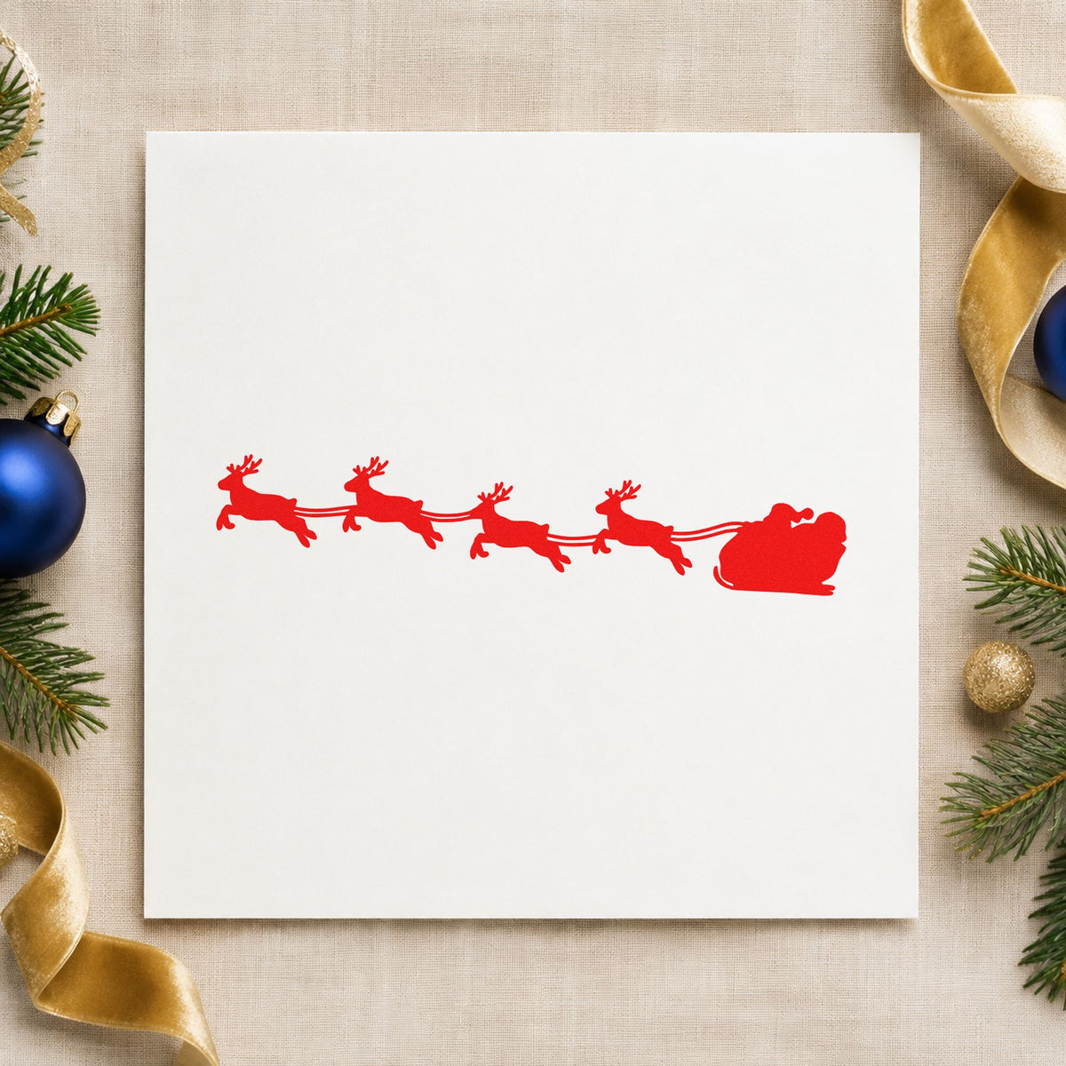 Santa Sleigh Reindeer Silhouette craft stamp in red ink on cardstock, an easy option for mantel scarf printing.