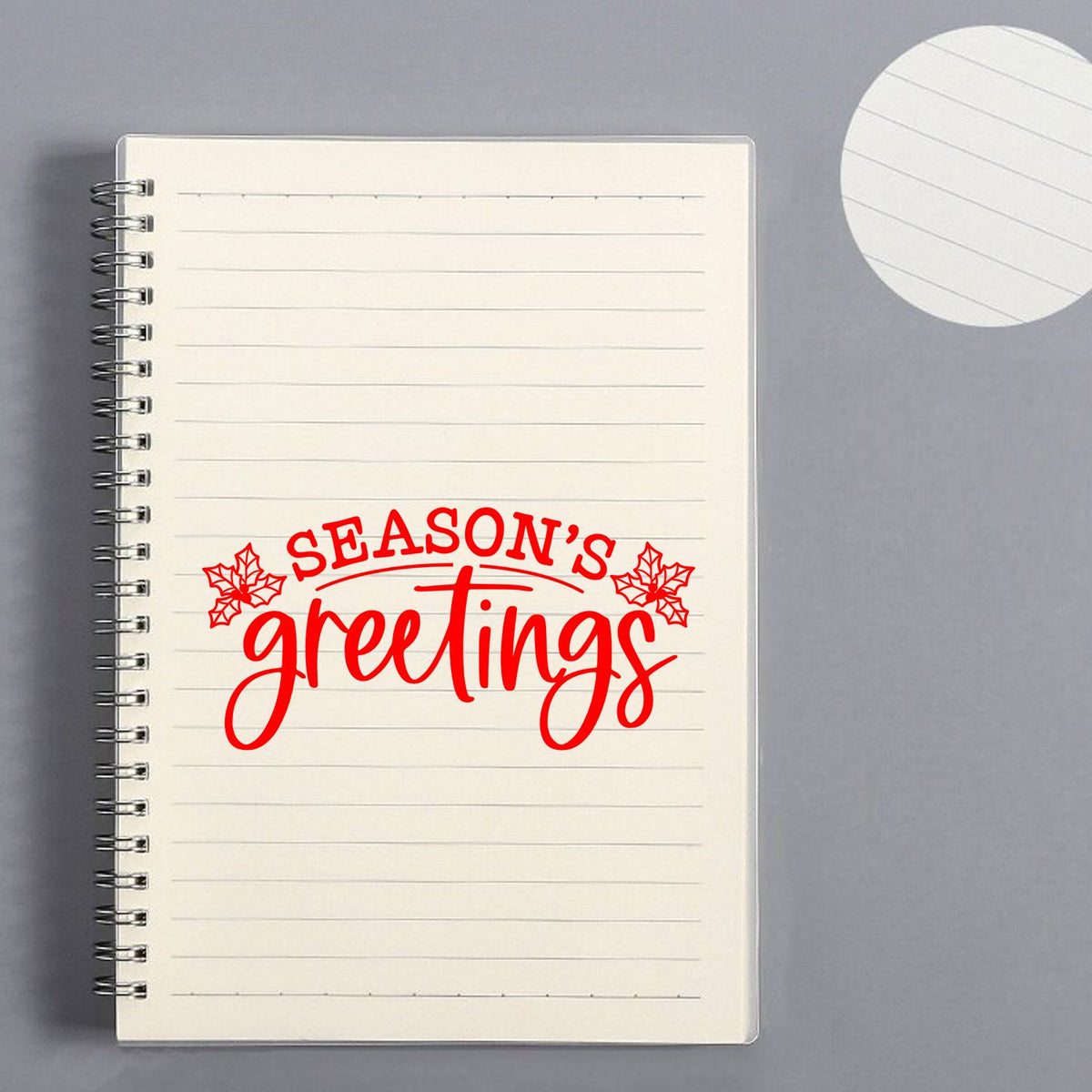 Seasons Greetings holiday rubber stamp design with holly accents for festive cards, tags, and seasonal stationery.