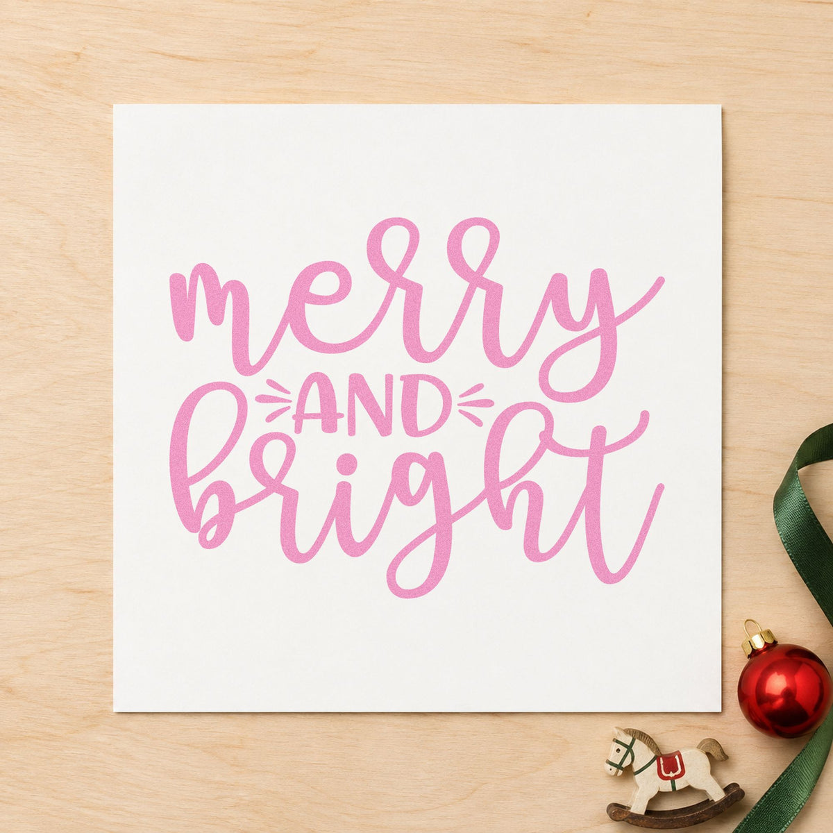 Merry And Bright Script craft stamp in purple ink on cardstock, an easy option for wrap service album.