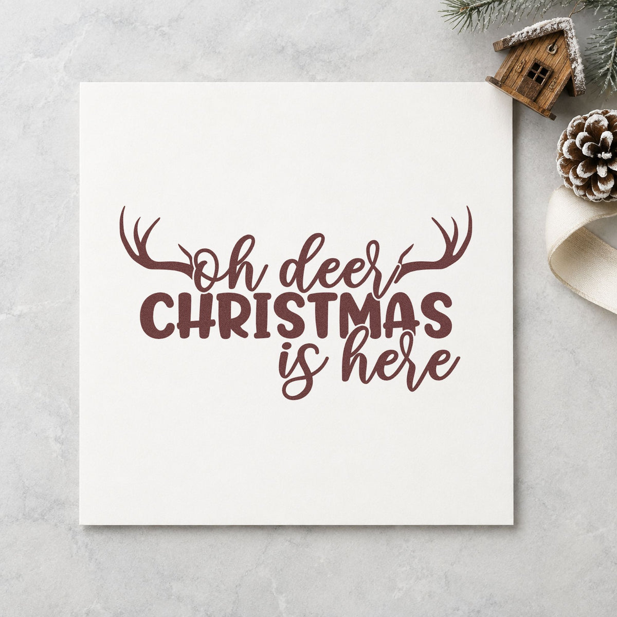 Oh Deer Christmas Is Here rubber stamp printed in brown ink, ready for deadline countdown sheet and similar paper crafts.
