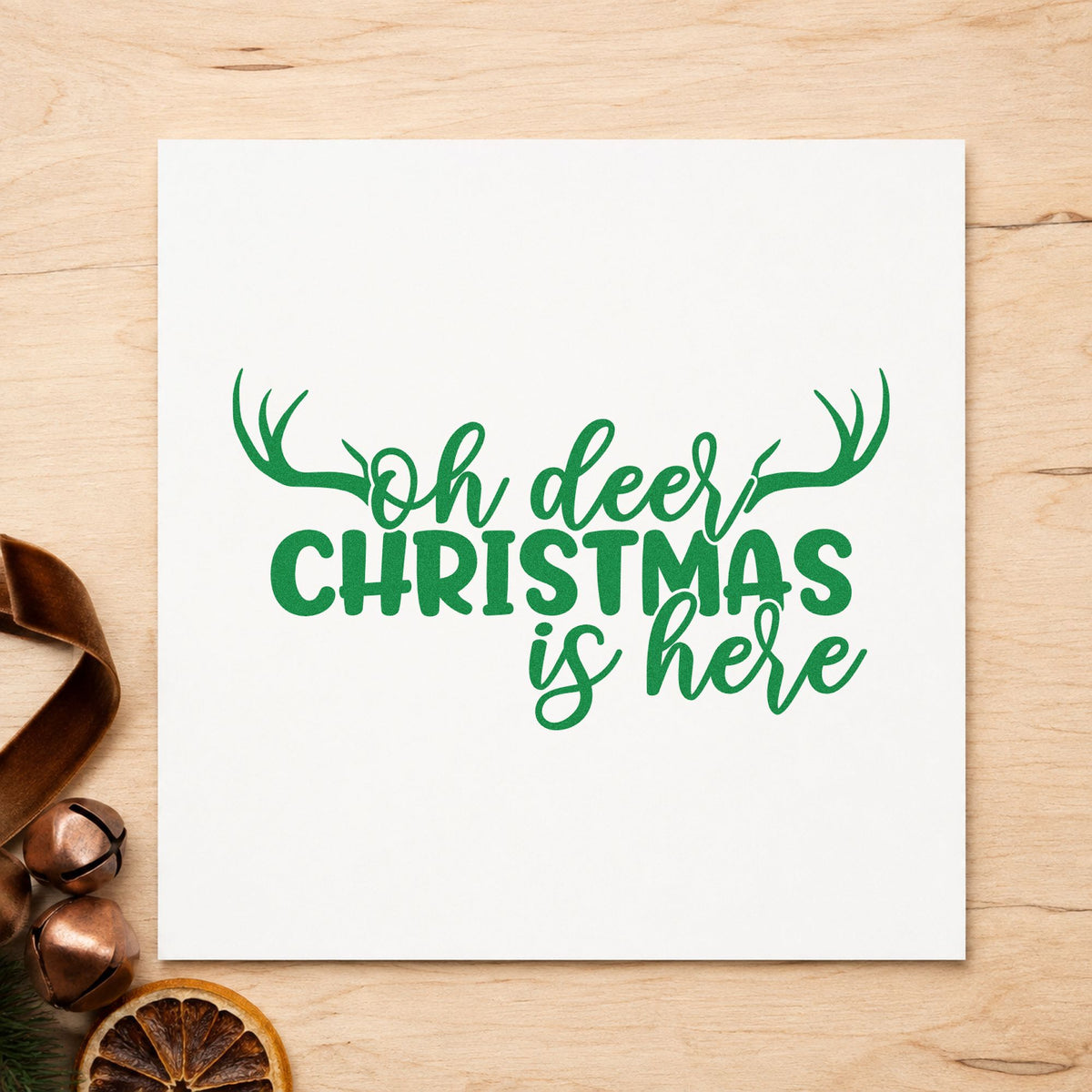Oh Deer Christmas Is Here craft stamp imprinted in green ink on paper, a design suited to framed mudroom hook.