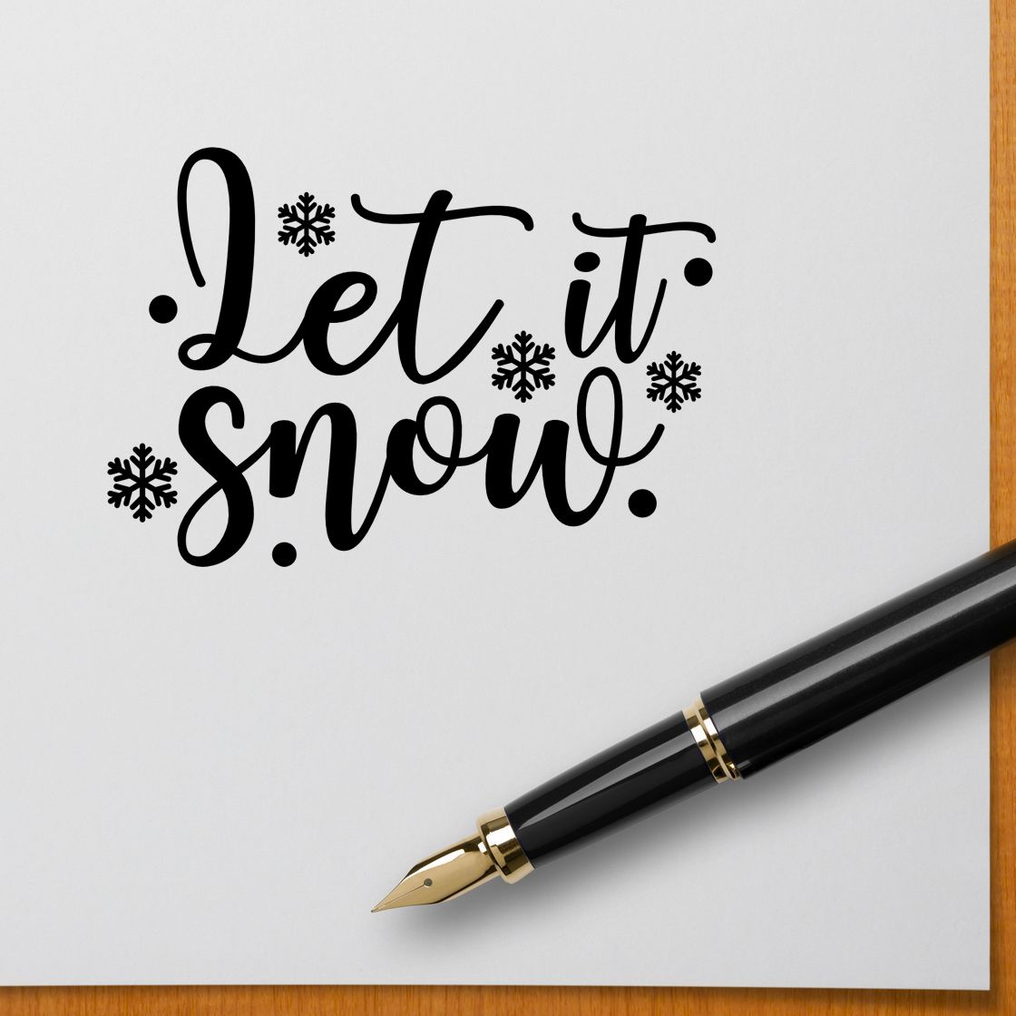 Let It Snow Snowflakes Pre-Inked Stamp – PSI imprint stamped in black ink. Large looping “Let It Snow” lettering is surrounded by snowflakes and dots.