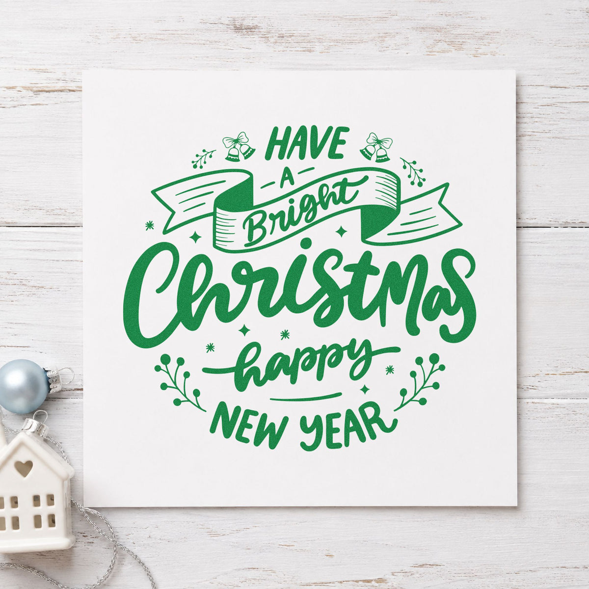 Bright Christmas Happy New Year craft stamp imprint in green ink on a handmade project, one idea being annual dinner menus.