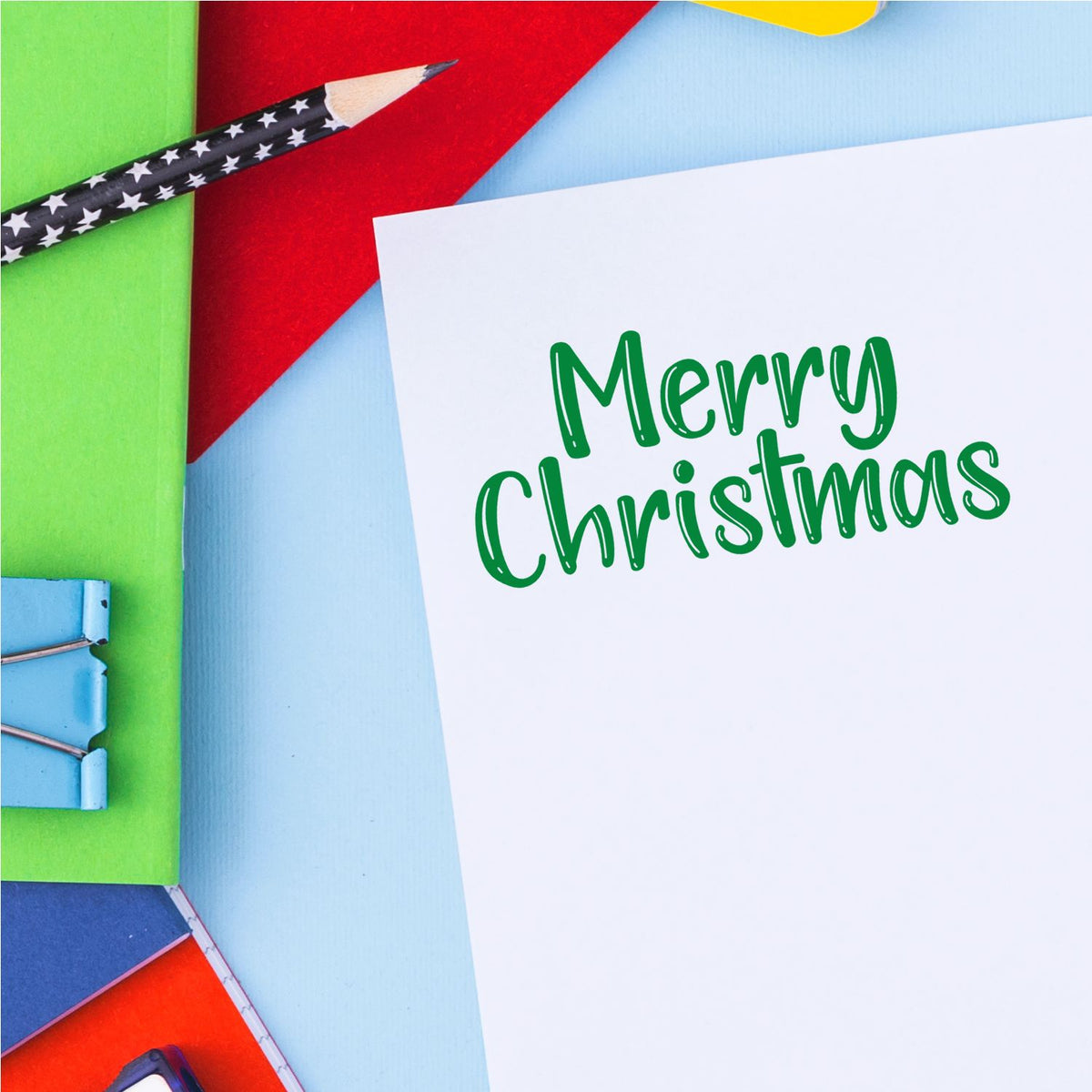 Merry Christmas rubber stamp design on a white card for holiday cards, scrapbooking, and festive crafts.