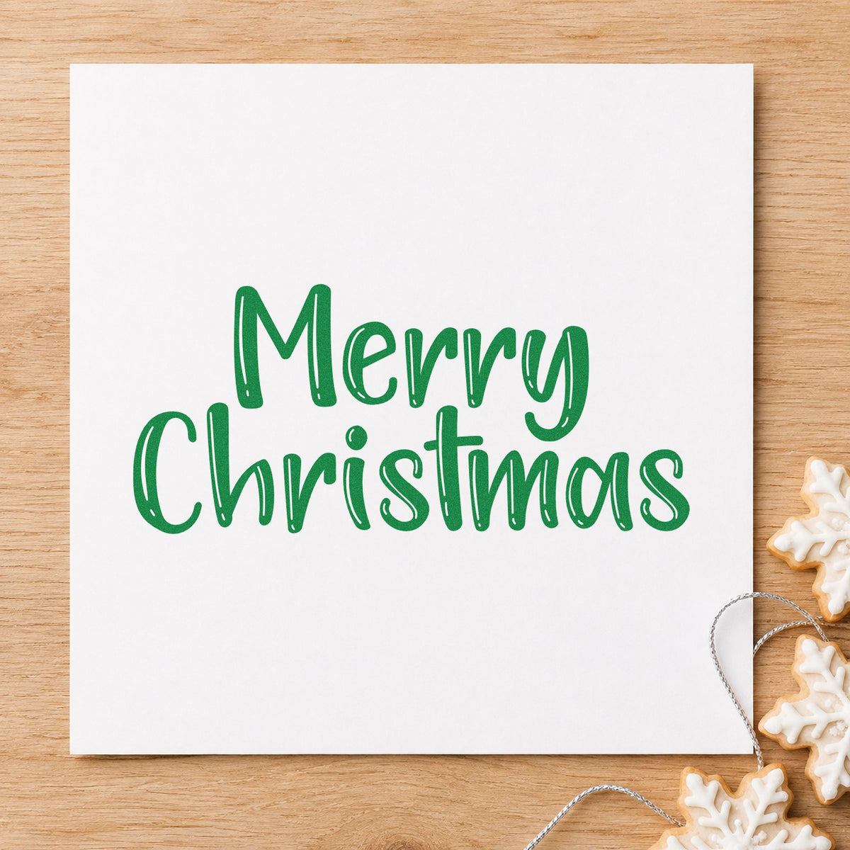 Merry Christmas Textured Letters craft stamp imprint in green ink on a handmade project, one idea being market price signs.
