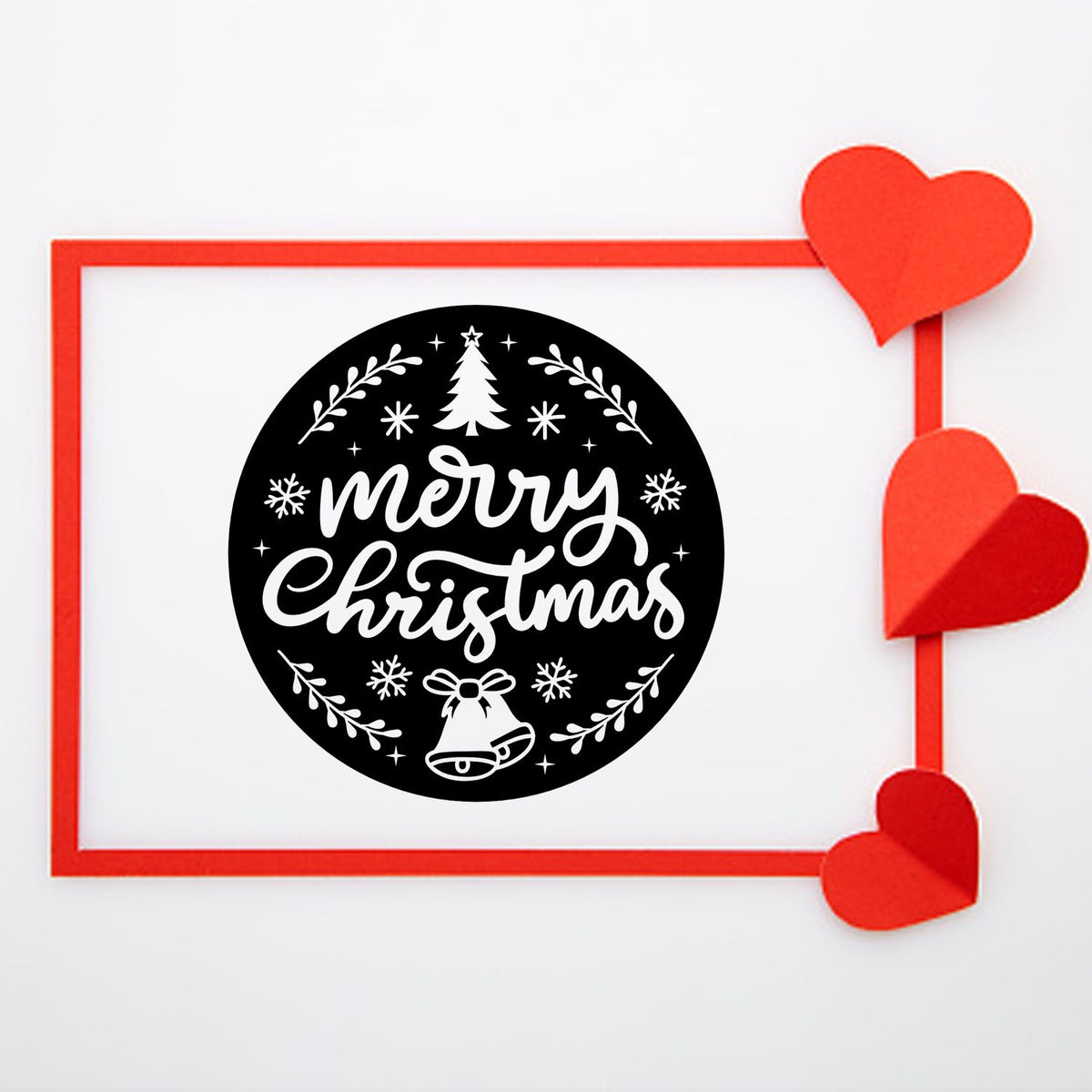 Merry Christmas rubber stamp design with tree, bells, snowflakes and festive holiday frame.