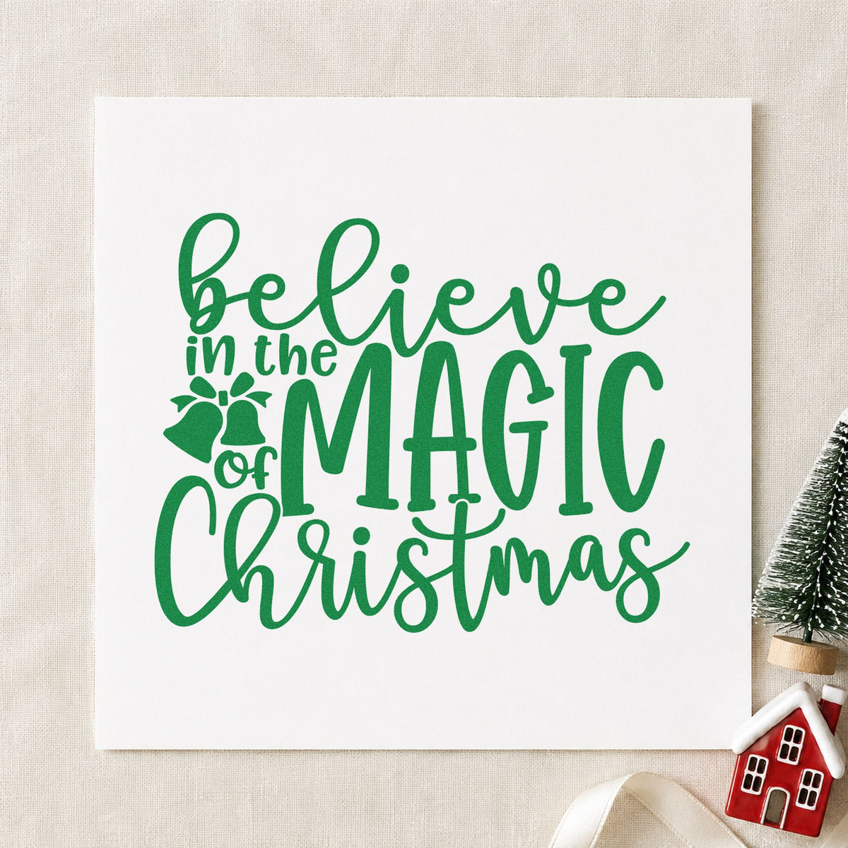 Believe Magic Christmas Holly craft stamp imprint in green ink on a handmade project, one idea being minimal gift tags.