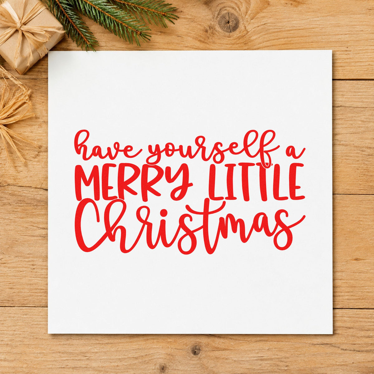 Have Yourself Merry Little Christmas rubber stamp shown in red ink, stamped for projects such as sleeve insert labels.