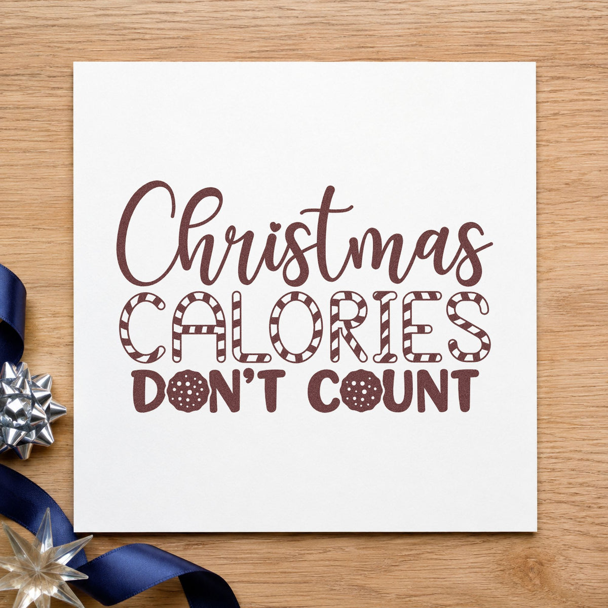 Christmas Calories Don't Count rubber stamp printed in brown ink, ready for workout log sheet and similar paper crafts.