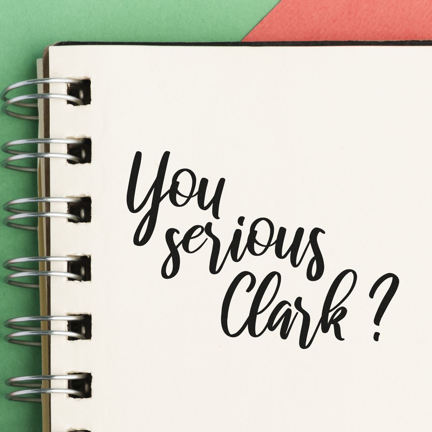 Funny You Serious Clark? rubber stamp impression on a notebook page for holiday crafting, scrapbooking, and card making.
