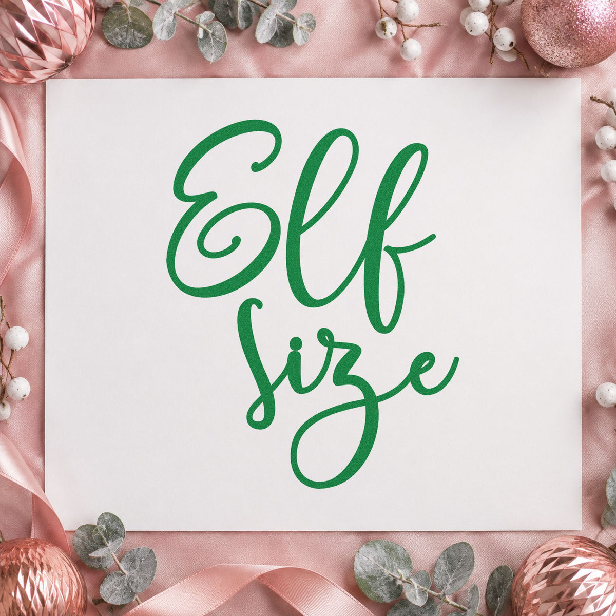 Elf Size Script craft stamp imprint in green ink on a handmade project, one idea being petite gift tags.
