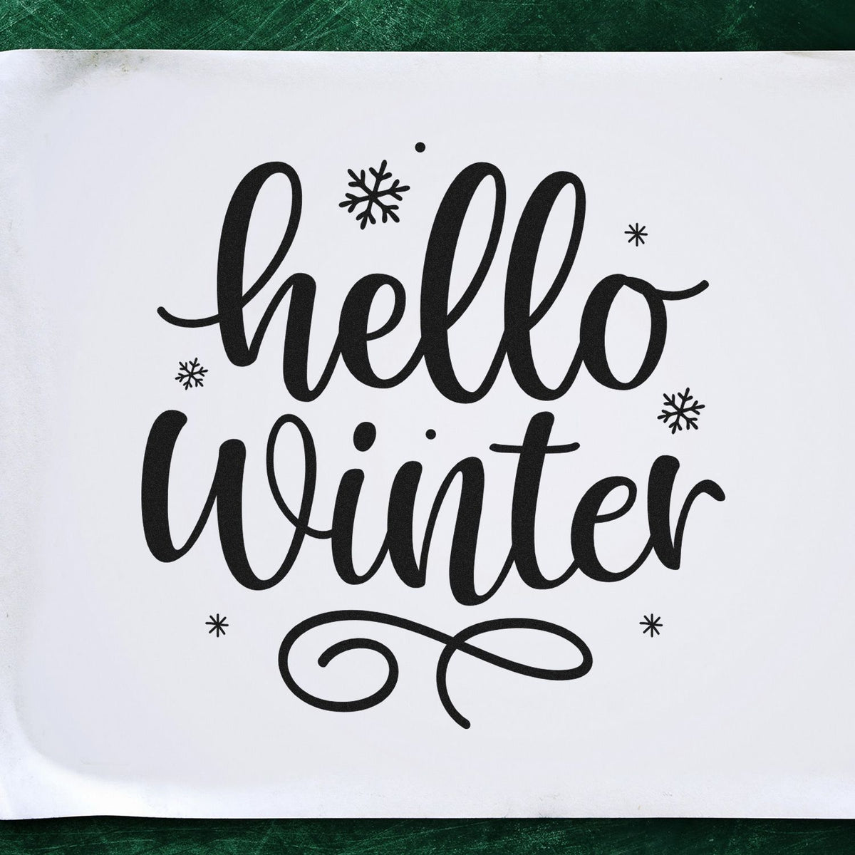 Hello Winter rubber stamp design with snowflake accents for seasonal cards, crafts, and holiday packaging.